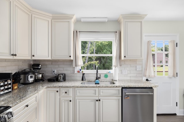 405 Castaway Dr, Kingsport, TN 37663 - kitchen with stainless steel appliances, a sink, tasteful backsplash, and healthy amount of natural light