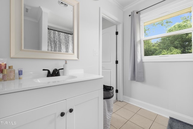 405 Castaway Dr, Kingsport, TN 37663 - bathroom with crown molding, vanity, baseboards, and tile patterned floors