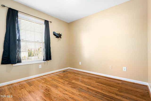 1213 American Way, Jonesborough, TN 37659 - unfurnished room featuring wood finished floors and baseboards