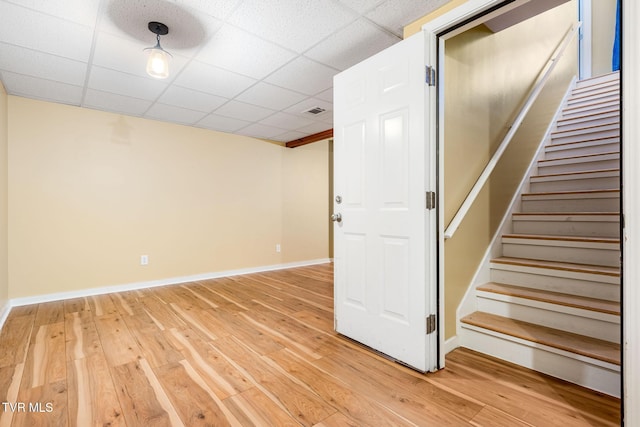 1213 American Way, Jonesborough, TN 37659 - finished below grade area with stairway, light wood-style floors, baseboards, and a drop ceiling