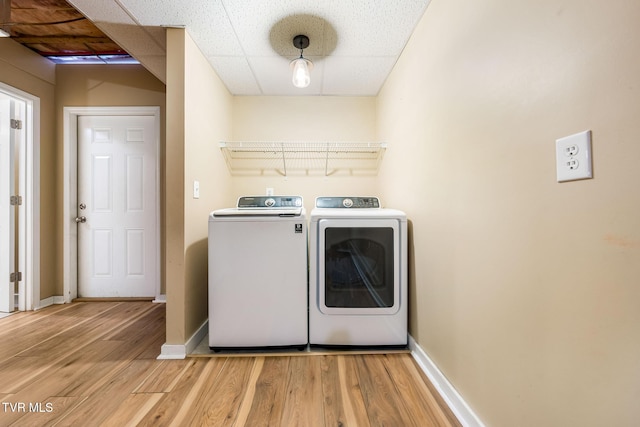 1213 American Way, Jonesborough, TN 37659 - washroom with washer and dryer, light wood finished floors, and baseboards