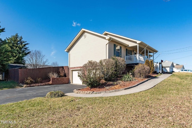 1213 American Way, Jonesborough, TN 37659 - view of side of home with driveway, an attached garage, and brick siding