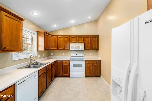1213 American Way, Jonesborough, TN 37659 - kitchen with white appliances, a sink, brown cabinets, recessed lighting, and light countertops