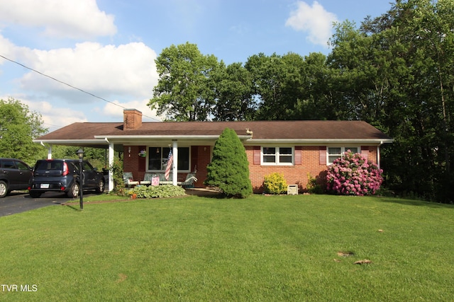 16319 Mary St, Abingdon, VA 24210 - ranch-style home featuring a carport, brick siding, covered porch, a chimney, and a front yard