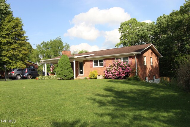 16319 Mary St, Abingdon, VA 24210 - ranch-style home featuring a front lawn, brick siding, and a chimney