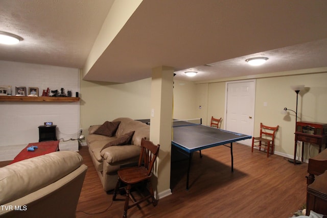16319 Mary St, Abingdon, VA 24210 - recreation room with wood finished floors, a textured ceiling, and baseboards