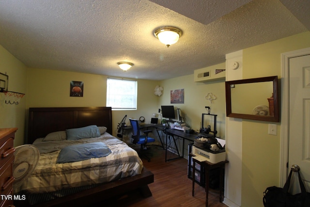 16319 Mary St, Abingdon, VA 24210 - bedroom with a textured ceiling, dark wood-style flooring, and an office area