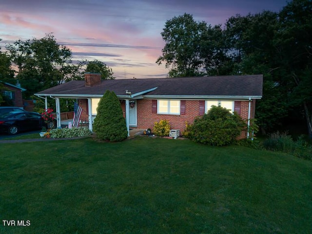 16319 Mary St, Abingdon, VA 24210 - ranch-style house with brick siding, a front lawn, and a chimney