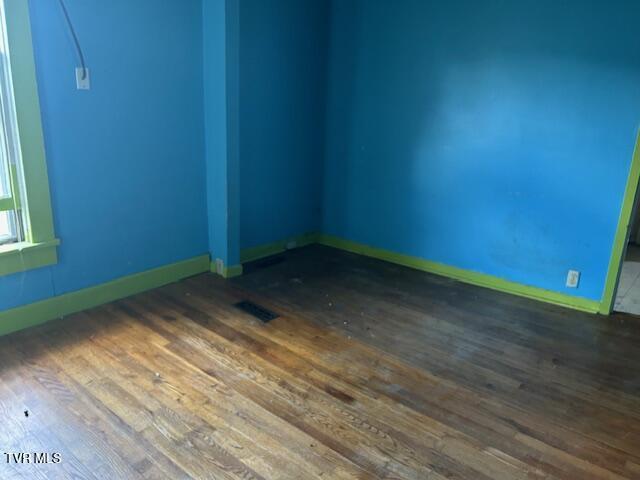 1014 Maple St, Kingsport, TN 37660 - unfurnished room featuring hardwood / wood-style floors and baseboards