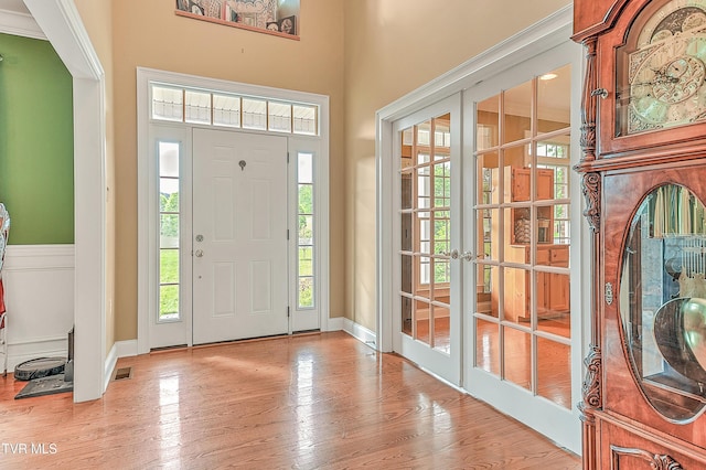 2041 King College Rd, Bristol, TN 37620 - foyer entrance featuring healthy amount of natural light, light wood-style floors, and french doors