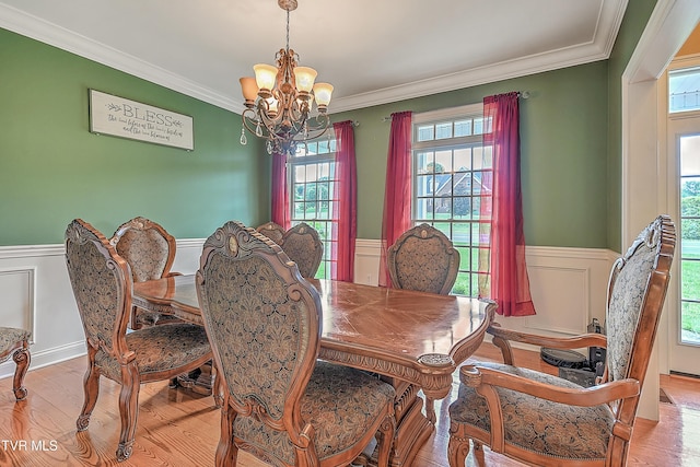 2041 King College Rd, Bristol, TN 37620 - dining space featuring a chandelier, wainscoting, healthy amount of natural light, ornamental molding, and light wood-style floors