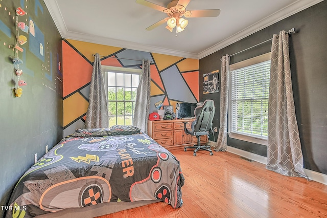 2041 King College Rd, Bristol, TN 37620 - bedroom featuring wood finished floors, crown molding, multiple windows, baseboards, and a ceiling fan