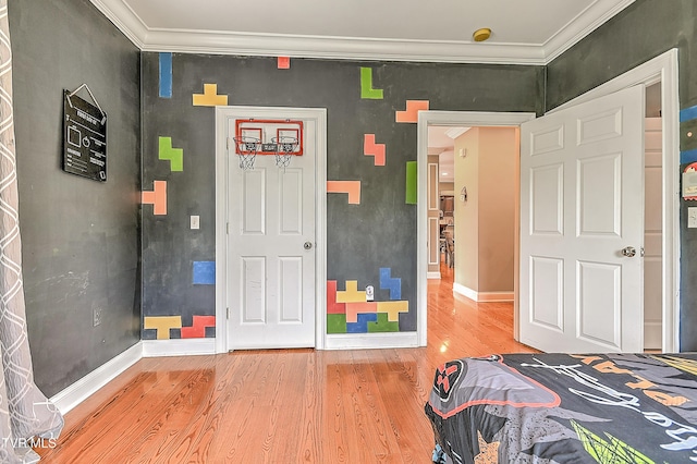 2041 King College Rd, Bristol, TN 37620 - bedroom featuring wood finished floors, ornamental molding, and baseboards