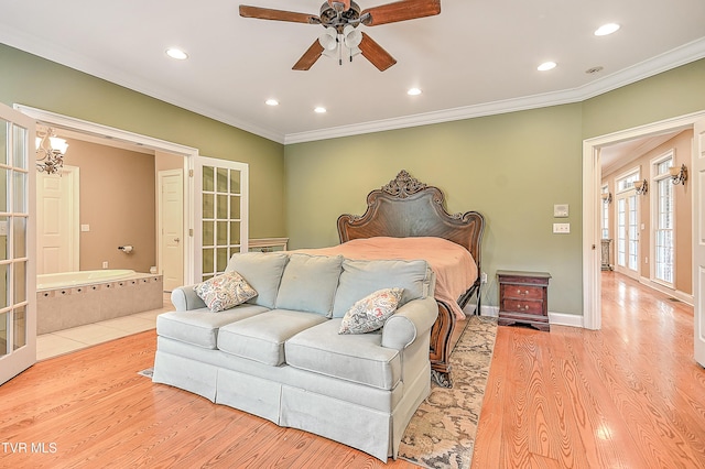 2041 King College Rd, Bristol, TN 37620 - bedroom with ornamental molding, wood finished floors, french doors, recessed lighting, and baseboards