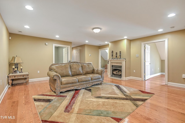 2041 King College Rd, Bristol, TN 37620 - living area with light wood-style floors, baseboards, recessed lighting, and a fireplace