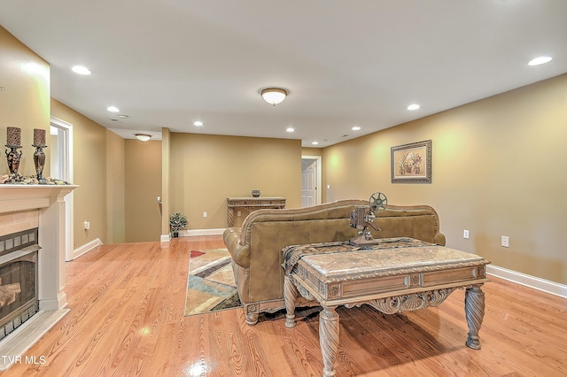 2041 King College Rd, Bristol, TN 37620 - living room featuring a tiled fireplace, light wood finished floors, baseboards, and recessed lighting