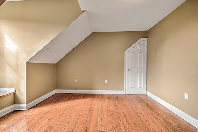 2041 King College Rd, Bristol, TN 37620 - additional living space with light wood-type flooring, lofted ceiling, and baseboards