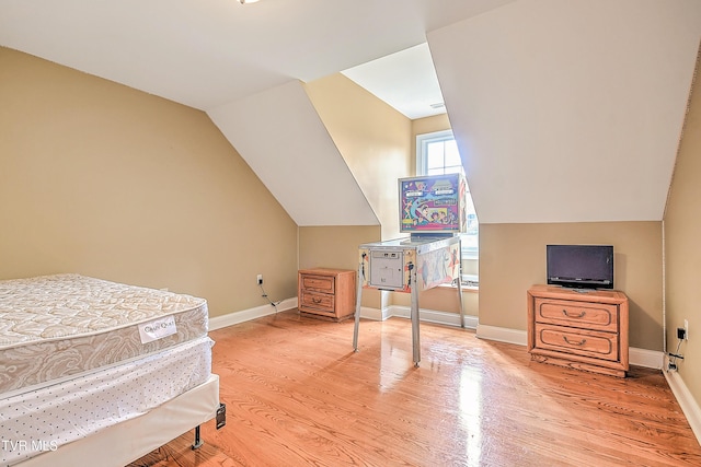 2041 King College Rd, Bristol, TN 37620 - additional living space featuring light wood-type flooring, baseboards, and vaulted ceiling