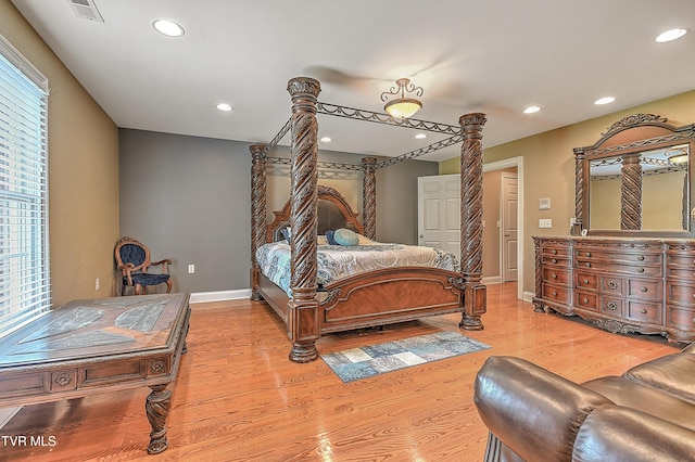 2041 King College Rd, Bristol, TN 37620 - bedroom with light wood-style floors, recessed lighting, baseboards, and ornate columns