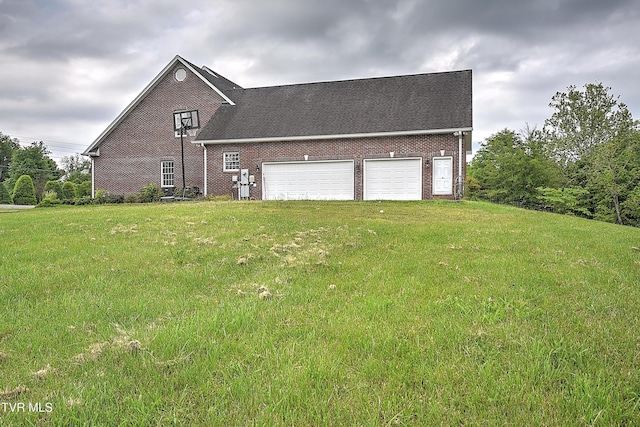2041 King College Rd, Bristol, TN 37620 - view of front of home with a front lawn, a garage, and brick siding