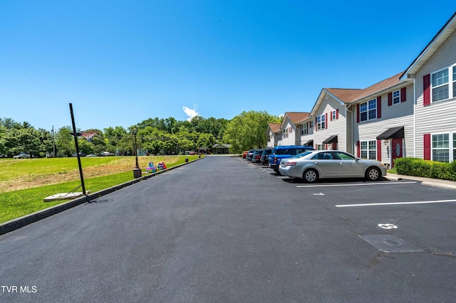 614 N Center St Unit 5, Johnson City, TN 37604 - view of asphalt street featuring curbs, a residential view, and street lights