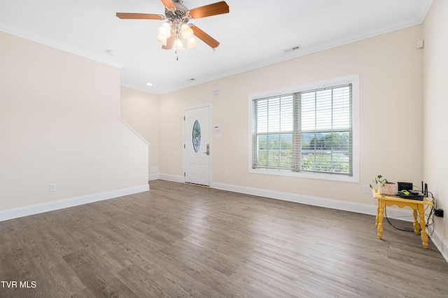 614 N Center St Unit 5, Johnson City, TN 37604 - entrance foyer with crown molding, a ceiling fan, wood finished floors, and baseboards