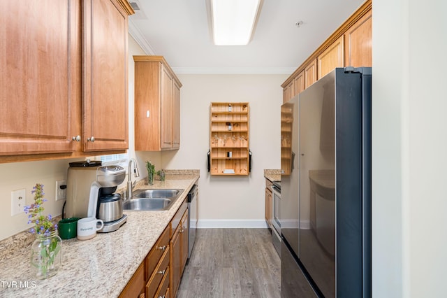 614 N Center St Unit 5, Johnson City, TN 37604 - kitchen featuring stainless steel appliances, a sink, dark wood finished floors, baseboards, and crown molding