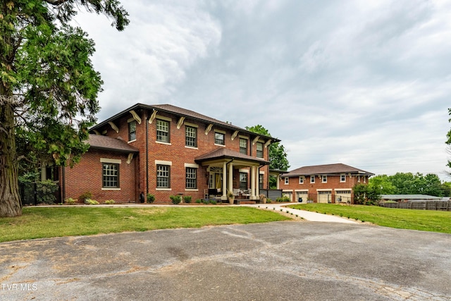 2107 Bartlett St, Johnson City, TN 37601 - italianate house featuring brick siding and a front yard
