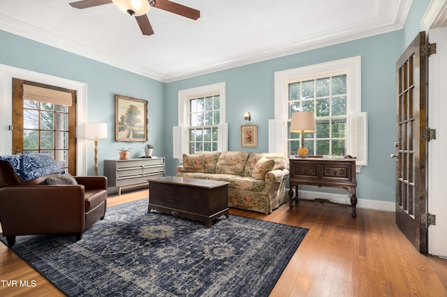 2107 Bartlett St, Johnson City, TN 37601 - living room featuring a ceiling fan, crown molding, hardwood / wood-style floors, and baseboards