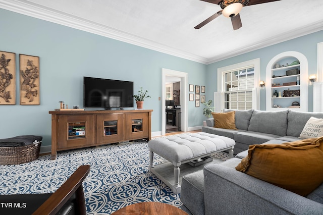 2107 Bartlett St, Johnson City, TN 37601 - living area with ornamental molding, ceiling fan, baseboards, and built in shelves