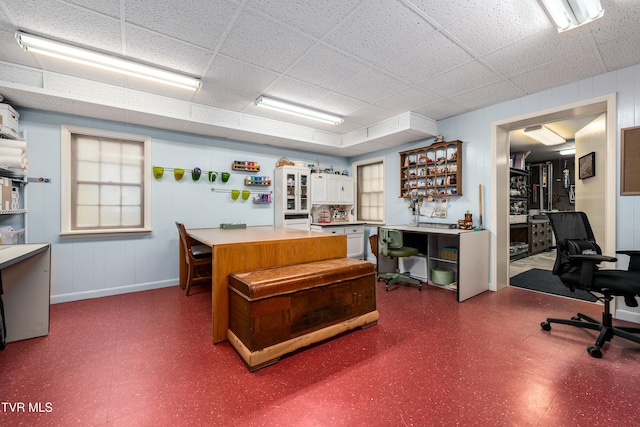 2107 Bartlett St, Johnson City, TN 37601 - office area featuring dark floors, a paneled ceiling, and baseboards