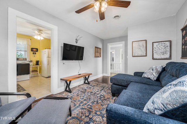 2107 Bartlett St, Johnson City, TN 37601 - living area featuring ceiling fan, wood finished floors, and baseboards