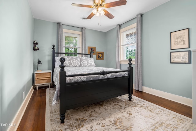 2107 Bartlett St, Johnson City, TN 37601 - bedroom with wood finished floors, baseboards, and ceiling fan