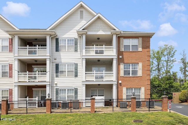 2008 Millennium Pl Unit 201, Johnson City, TN 37604 - view of building exterior with central AC unit and fence