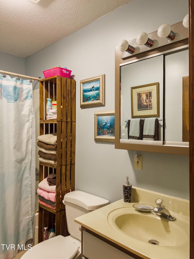 519 Foxgate Dr, Erwin, TN 37650 - bathroom with toilet, a textured ceiling, vanity, and shower / bathtub combination with curtain