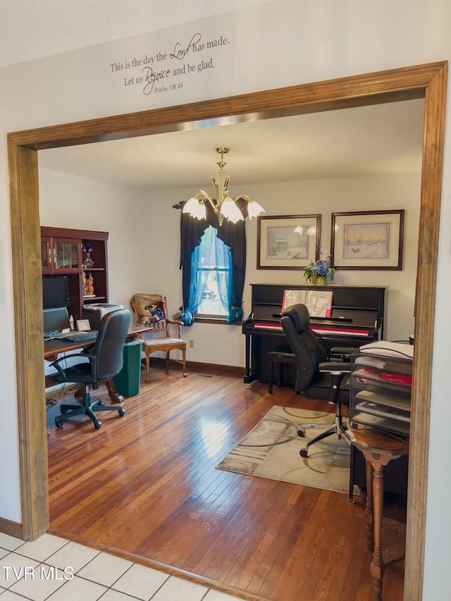 519 Foxgate Dr, Erwin, TN 37650 - office space featuring a chandelier, baseboards, and wood finished floors