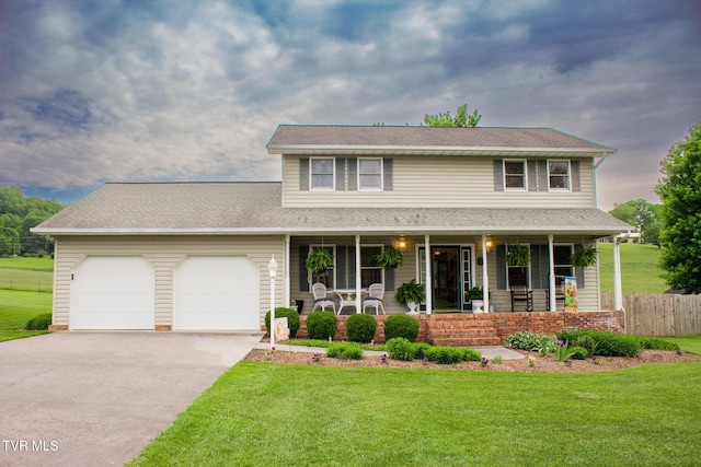 519 Foxgate Dr, Erwin, TN 37650 - view of front of home with a porch, a garage, concrete driveway, and roof with shingles