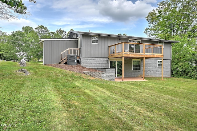145 Elm Heights St, Johnson City, TN 37615 - rear view of house featuring a patio, a lawn, central air condition unit, and a deck