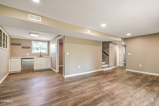 145 Elm Heights St, Johnson City, TN 37615 - kitchen with dishwasher, a sink, dark wood-style flooring, white cabinets, and baseboards
