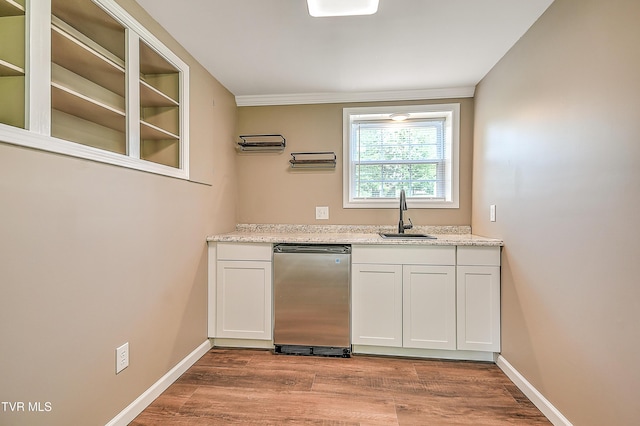 145 Elm Heights St, Johnson City, TN 37615 - kitchen featuring a sink, wood finished floors, white cabinets, and baseboards