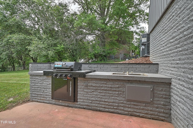 145 Elm Heights St, Johnson City, TN 37615 - view of patio with exterior kitchen and a sink