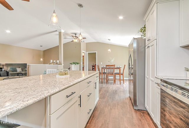 145 Elm Heights St, Johnson City, TN 37615 - kitchen featuring freestanding refrigerator, ceiling fan, stove, white cabinetry, and lofted ceiling