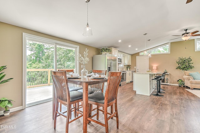 145 Elm Heights St, Johnson City, TN 37615 - dining room with light wood-style flooring, lofted ceiling, ceiling fan, baseboards, and recessed lighting