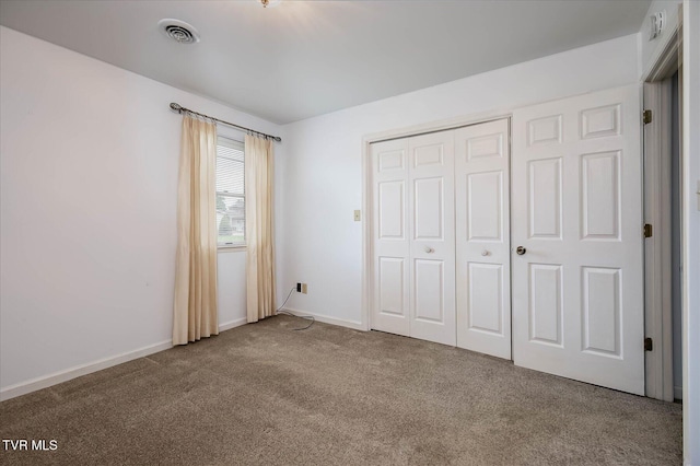 1544 Jessee St Unit Y, Kingsport, TN 37664 - unfurnished bedroom with carpet, a closet, and baseboards