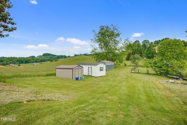 7175 Reedy Creek Rd, Bristol, VA 24202 - view of yard featuring a storage shed, an outdoor structure, and a view of countryside