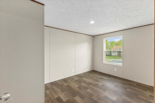 113 Hicks Dr, Johnson City, TN 37615 - empty room featuring wood finished floors, a textured ceiling, and crown molding