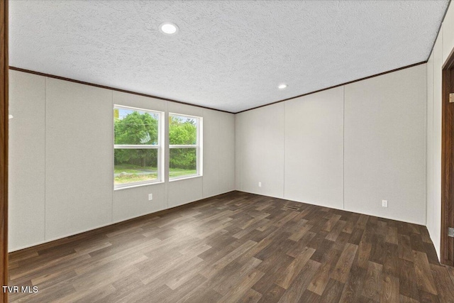 113 Hicks Dr, Johnson City, TN 37615 - empty room featuring wood finished floors, ornamental molding, a textured ceiling, a decorative wall, and recessed lighting