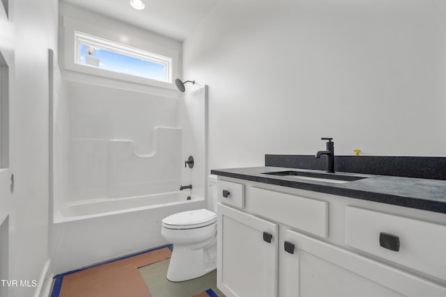 full bathroom featuring toilet, vanity, and  shower combination
