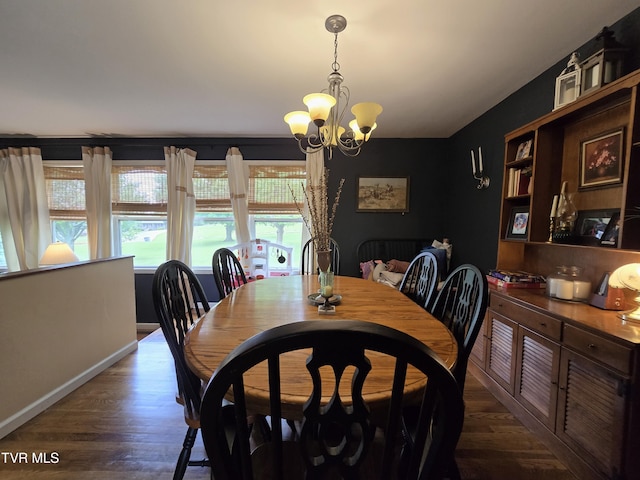 1382 Elijah Martin Rd, Whitesburg, TN 37891 - dining area with a chandelier, dark wood-style floors, and baseboards