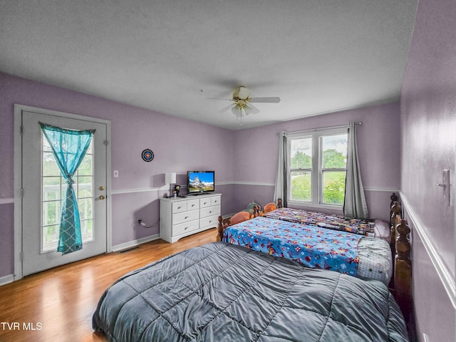 1382 Elijah Martin Rd, Whitesburg, TN 37891 - bedroom featuring wood finished floors and a ceiling fan